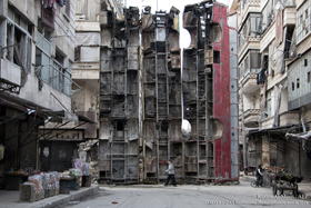 Aleppo, Under the Airstrikes photo by Karam Al-Masri / AFP