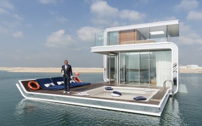 ドバイ中心部から4キロの海上に 浮かぶ売り出し中の別荘で、客を 待つ執事。海面下にベッドルーム とバスルームがあり、全面ガラス張 りの室内から海洋生物を観賞でき る。ゆくゆくは125棟が建設予定。 値 段は日本 円で約3憶2700万 円。写真はすべてドバイ、アラブ 首長国連邦。2017年1月16日